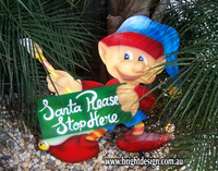4- E-13 CG Santa Stop Here Paintng Elf Outdoor Christmas Cut Out in a Home Garden Christmas Display