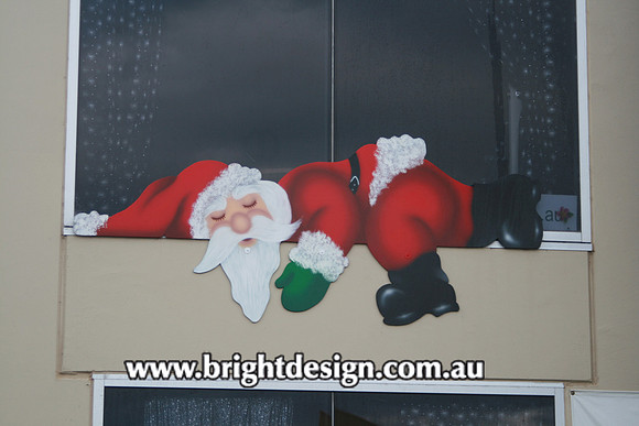 2- S-02 f Lazy Santa Sleeping on Commercial Factory Wall for Christmas Display